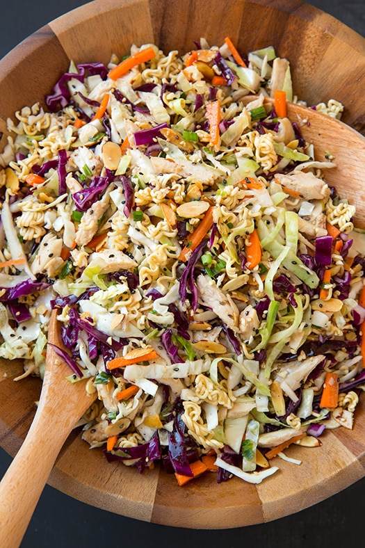 Asian Ramen Salad in wooden bowl with salad spoons