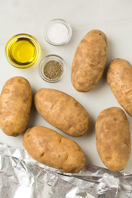 Ingredients for slow cooker baked potatoes shown here.