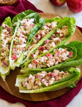 Apple chicken salad served in lettuce leaf boats.