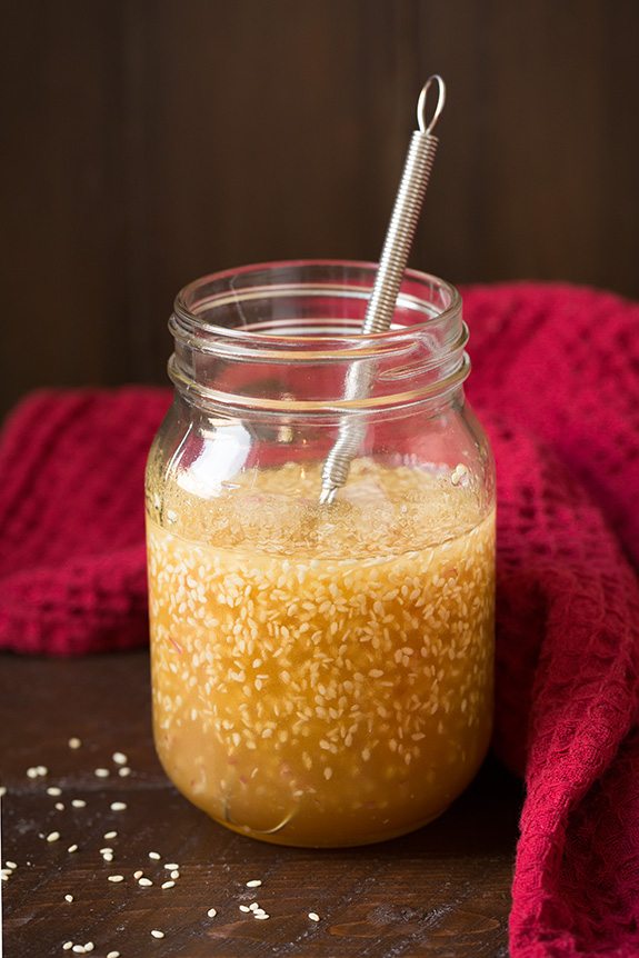 Sweet sesame seed vinaigrette in a mason jar.