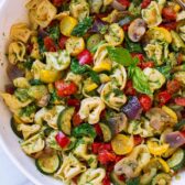 Cheese tortellini with pesto and roasted vegetables.