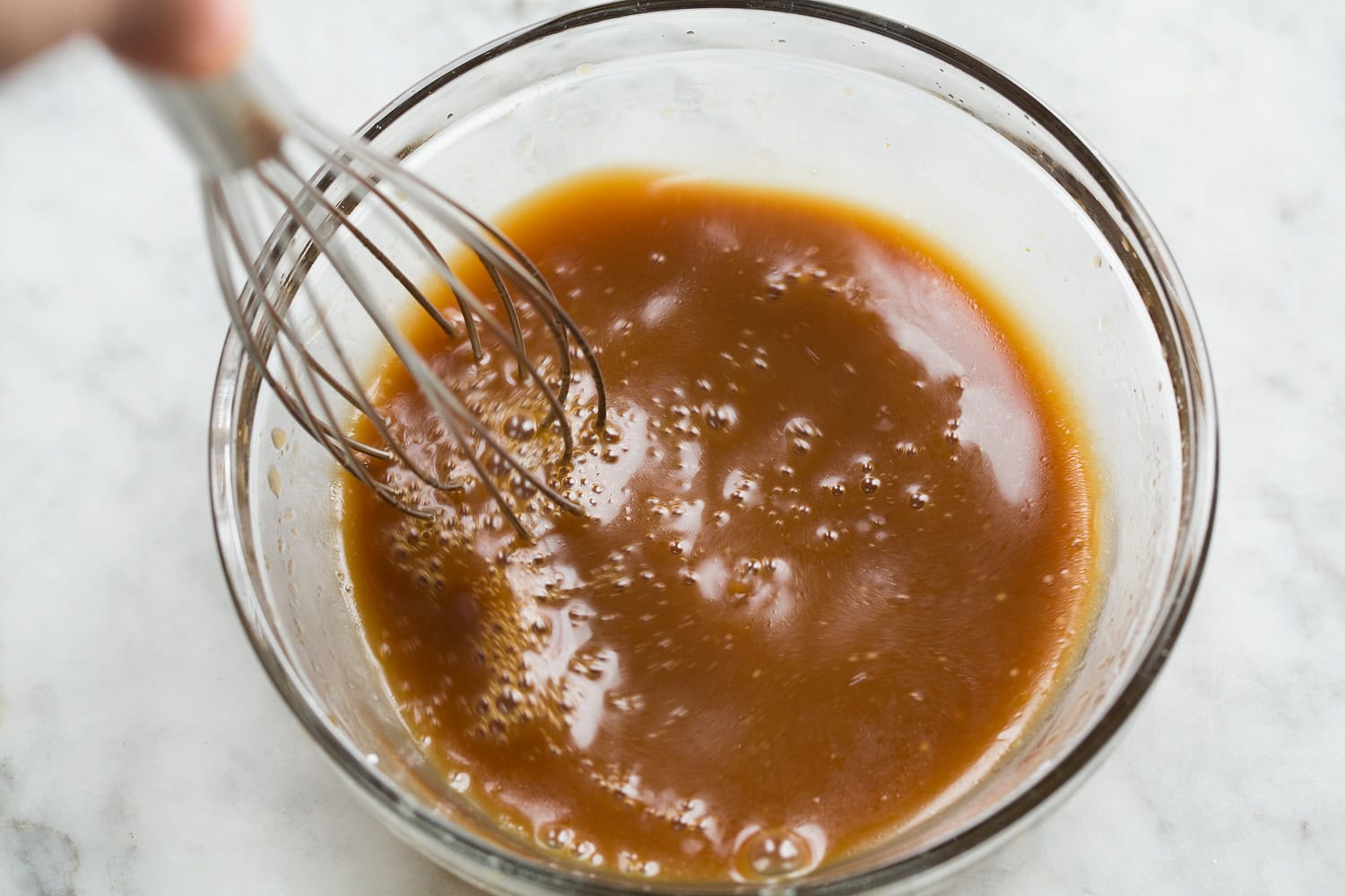 Lettuce wrap sauce shown being mixed together.