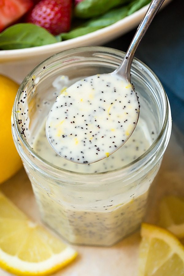 Creamy lemon poppy seed dressing in a jar. For strawberry spinach salad.