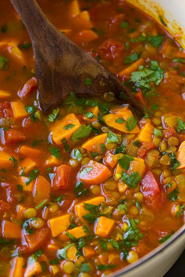 Close up image of sweet potato soup in a pot.