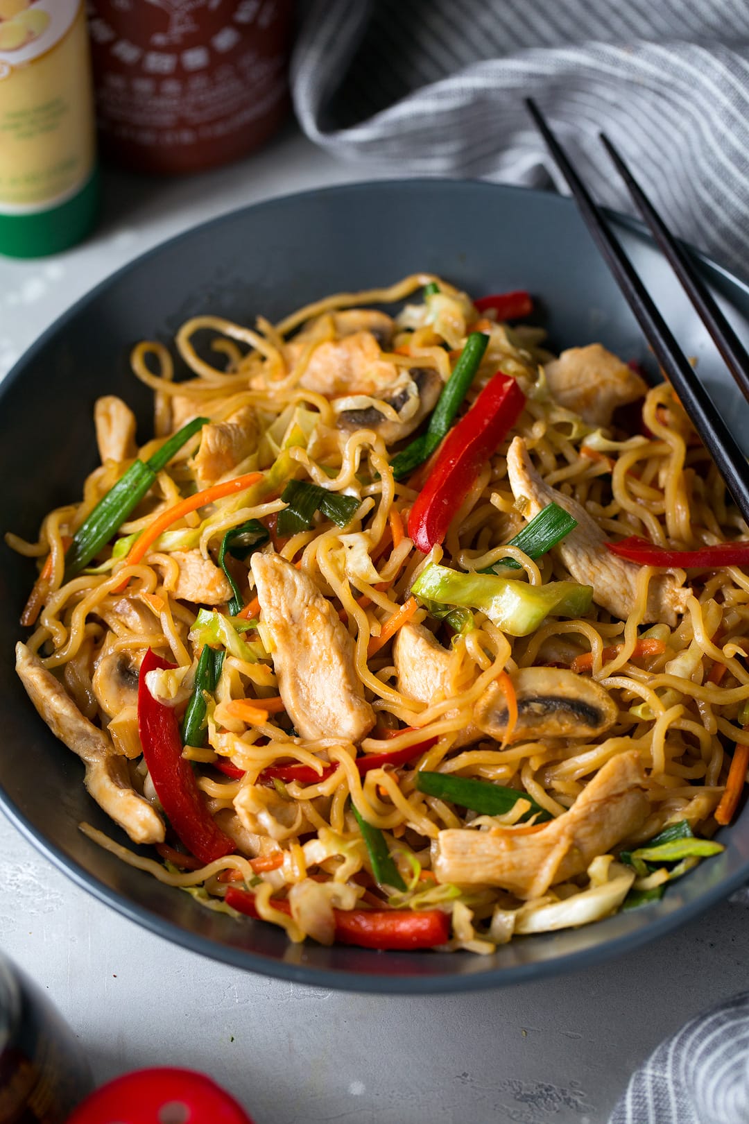 Chicken Yakisoba in gray bowl with chopsticks