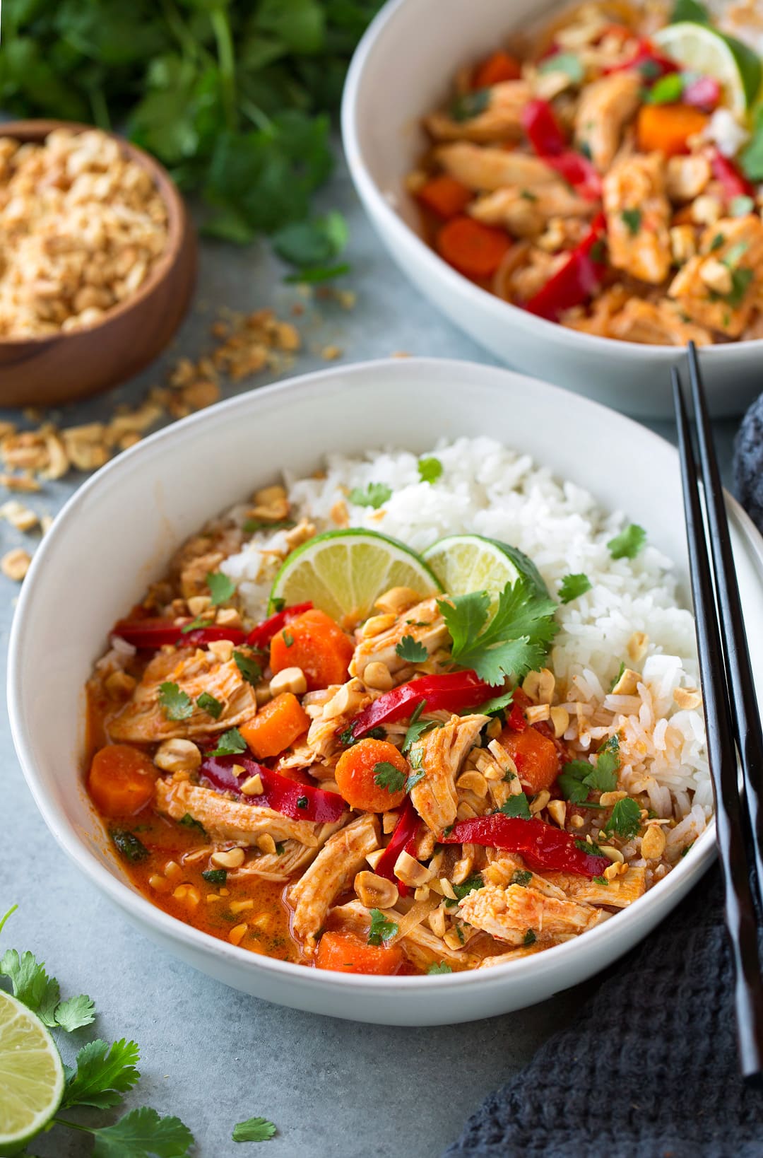 Thai Chicken Curry in a bowl with black chopsticks at the side