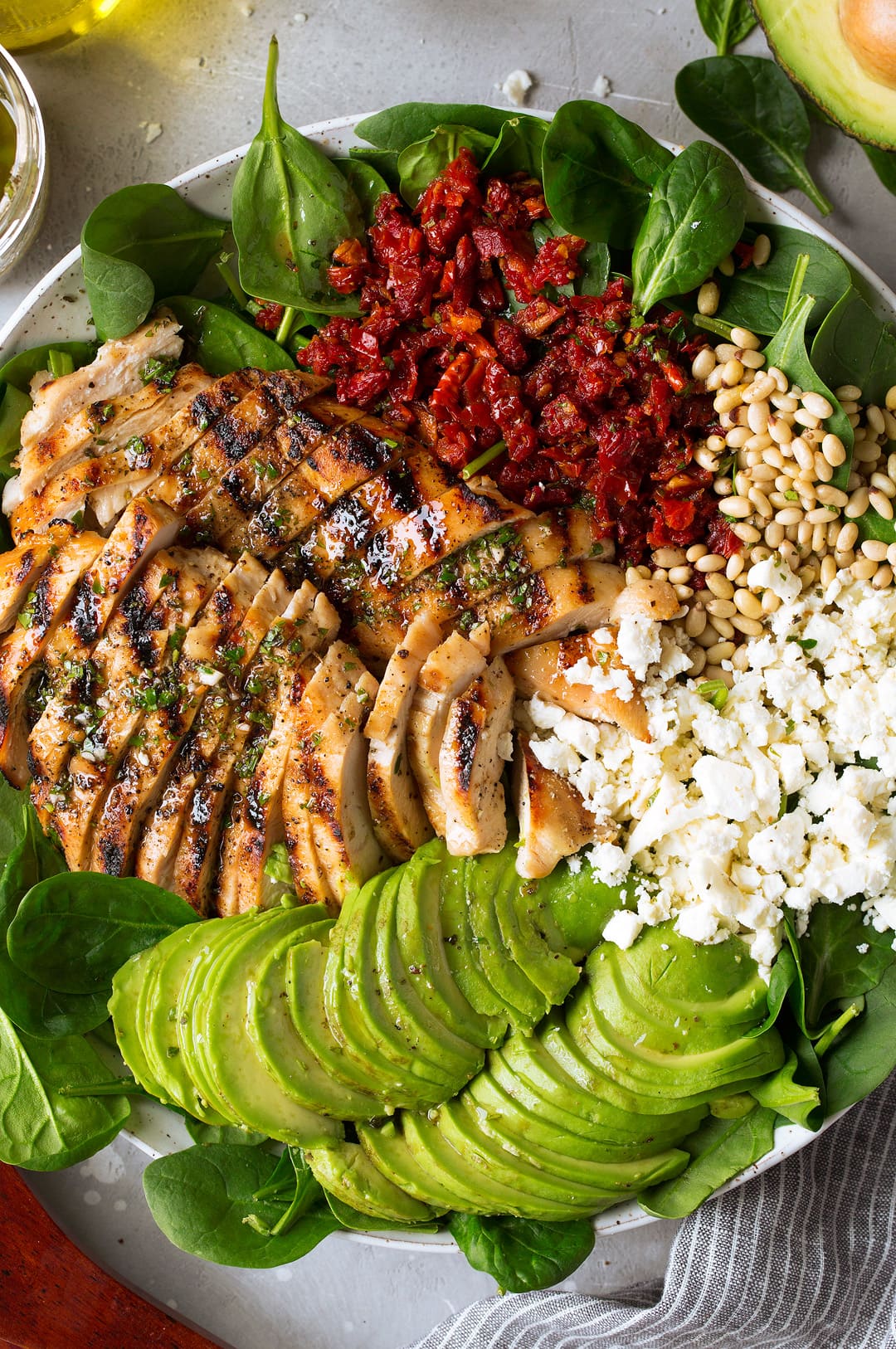 Grilled Chicken Sun Dried Tomato and Avocado Spinach Salad