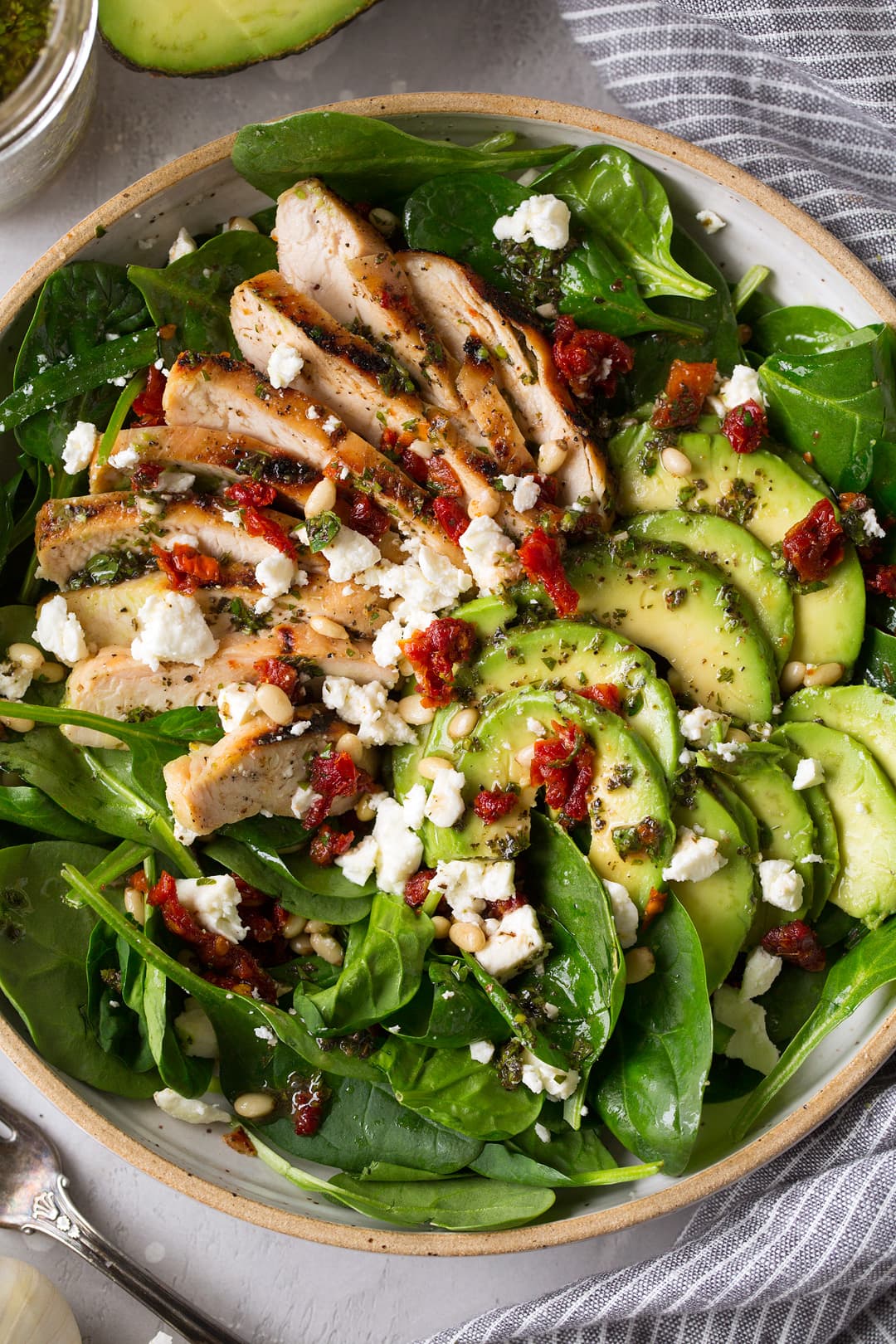 Grilled Chicken Sun Dried Tomato and Avocado Spinach Salad