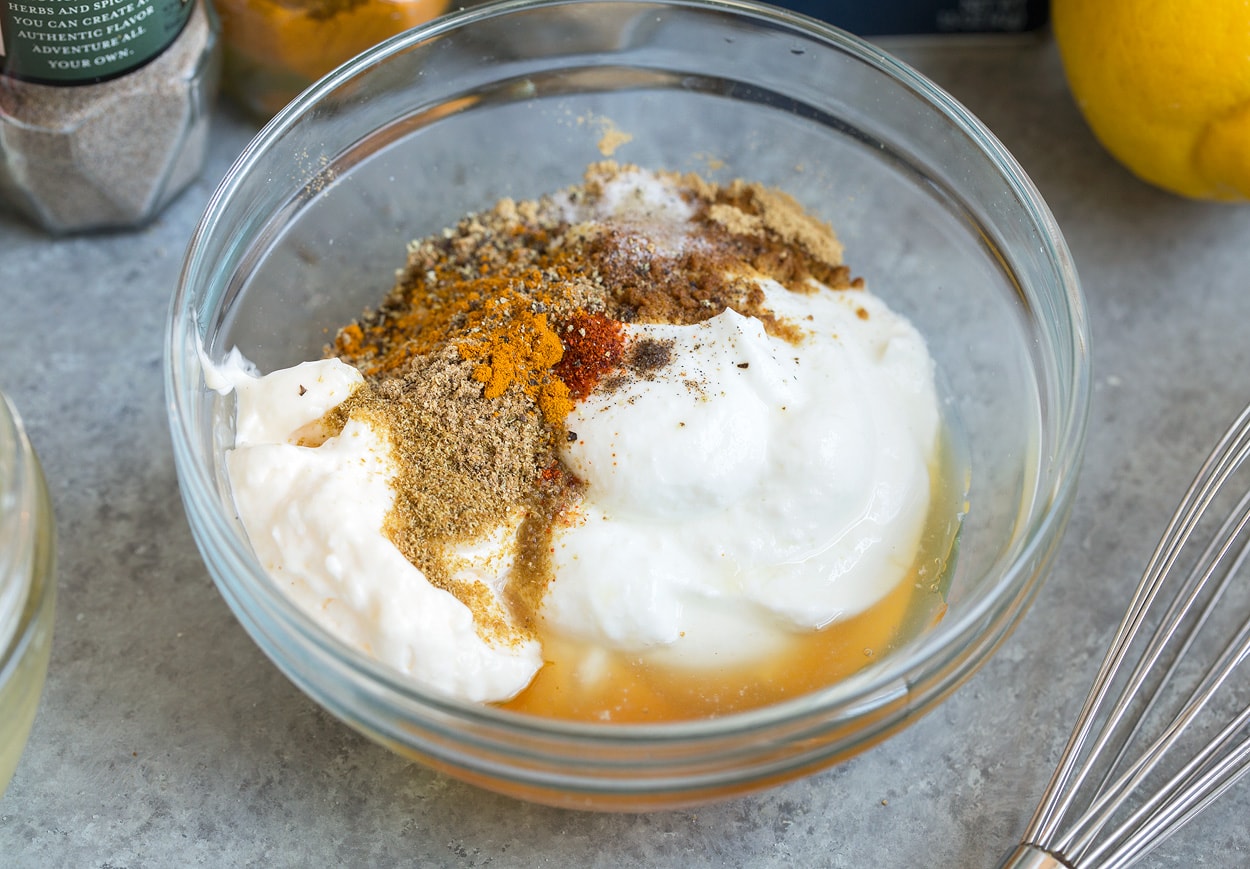 Curry Chicken Salad dressing mixture in a glass bowl