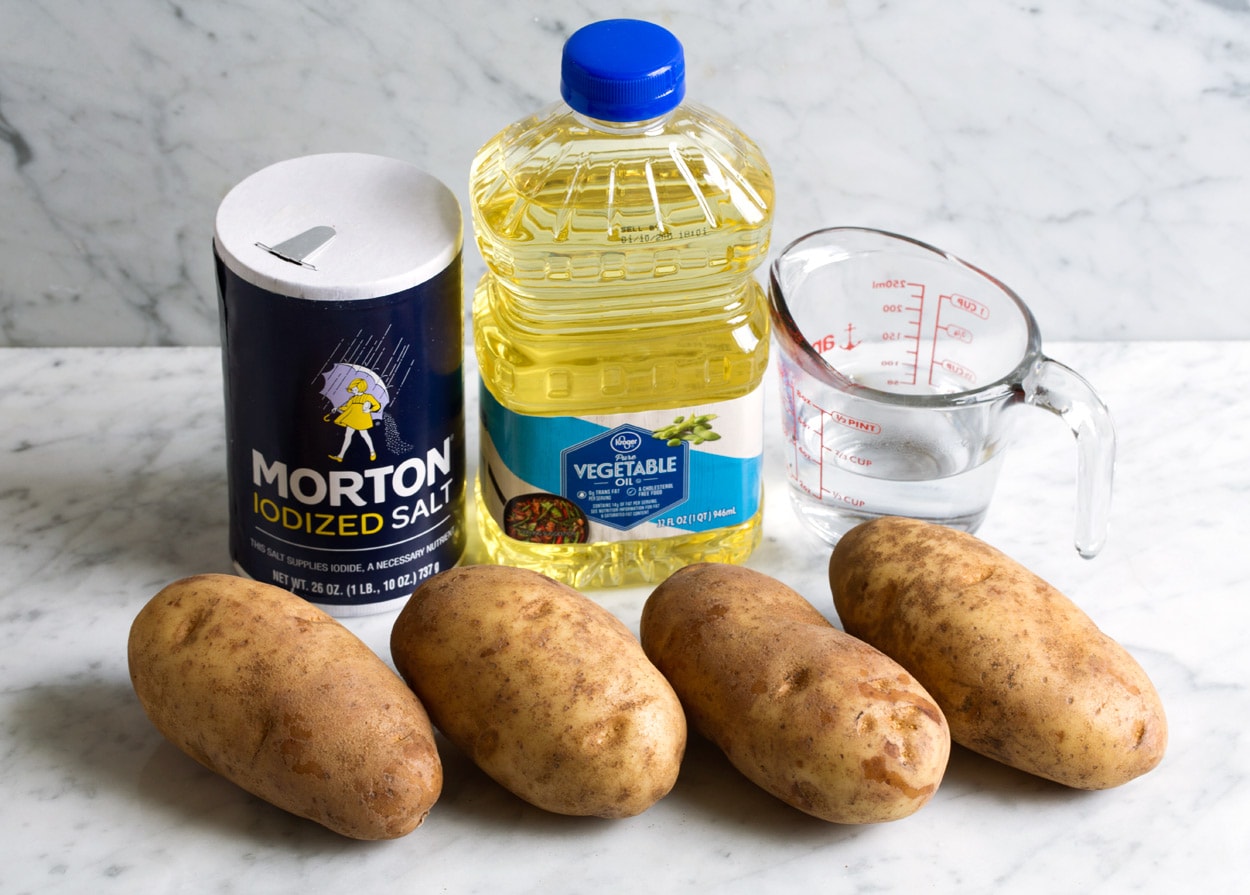 Baked Potatoes ingredients shown here potatoes water salt vegetable oil