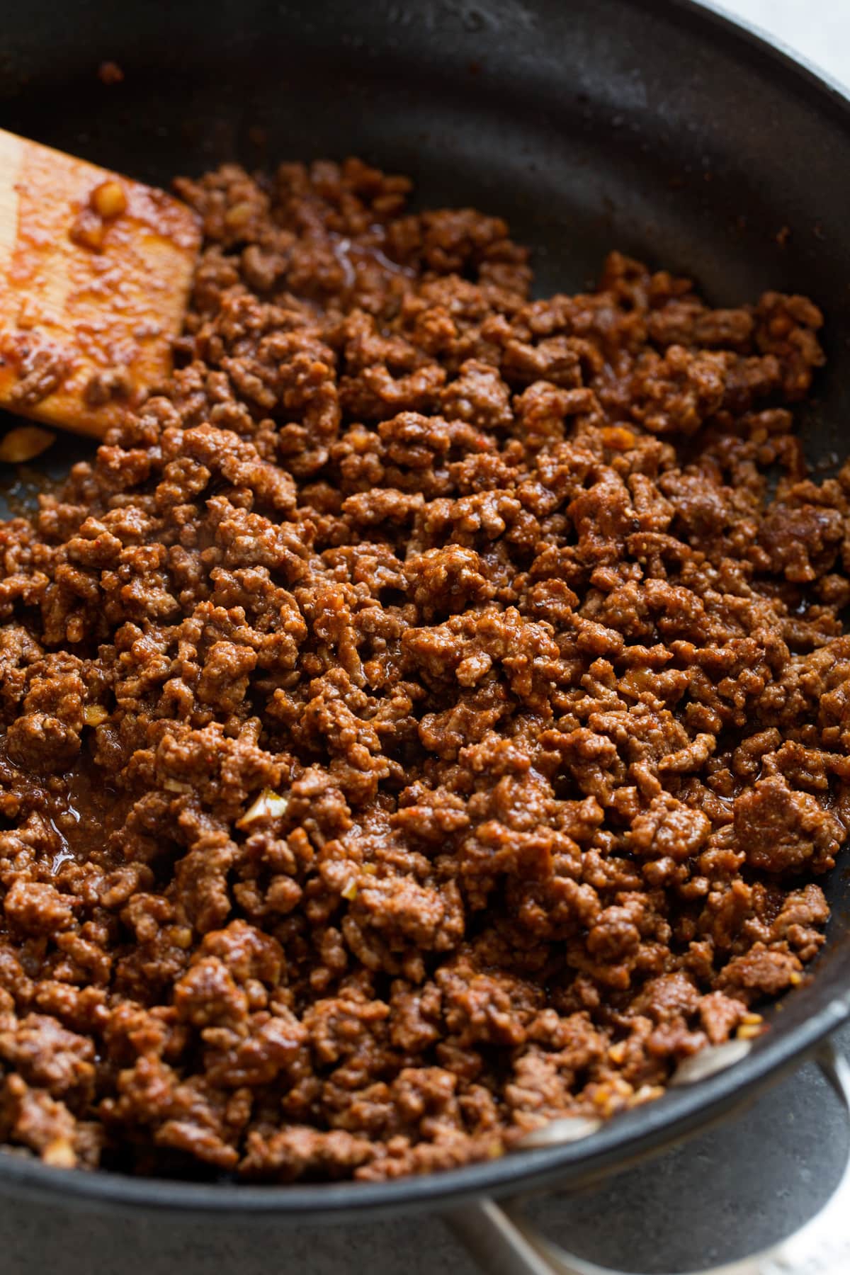 Ground beef taco meat filling in a skillet.