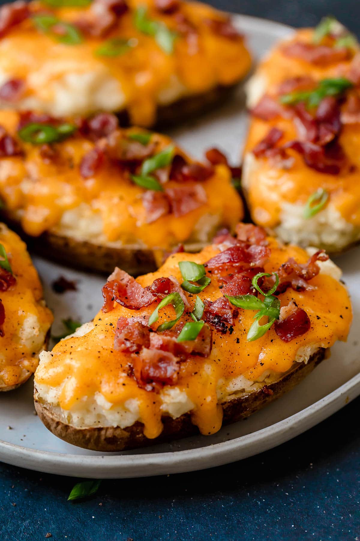 Side view of a filled twice baked potato.