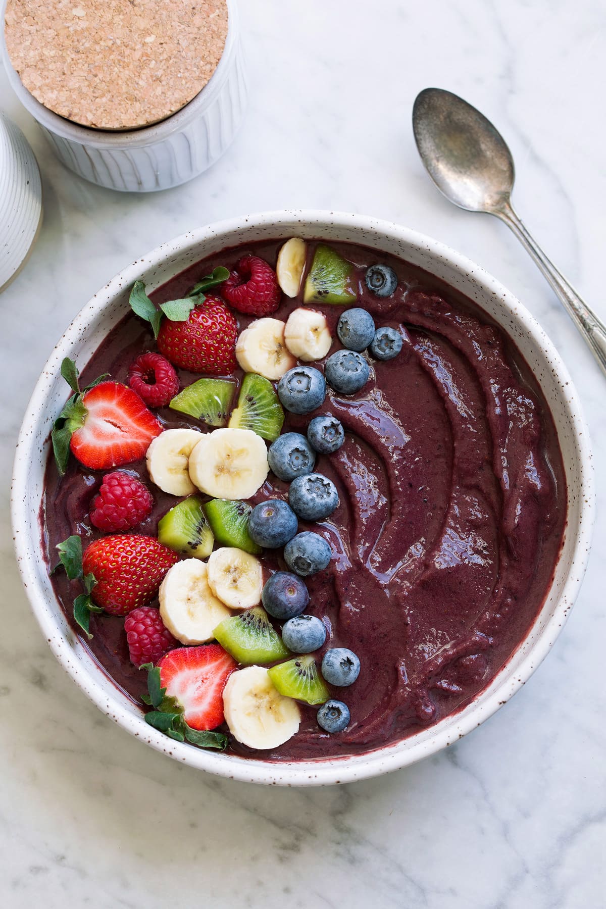 Acai bowl topped with fresh fruit