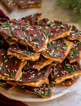 Christmas Crack layered on a serving plate.