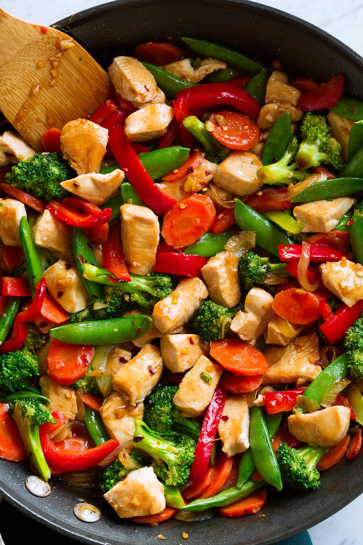 Healthy chicken stir fry in a pan.