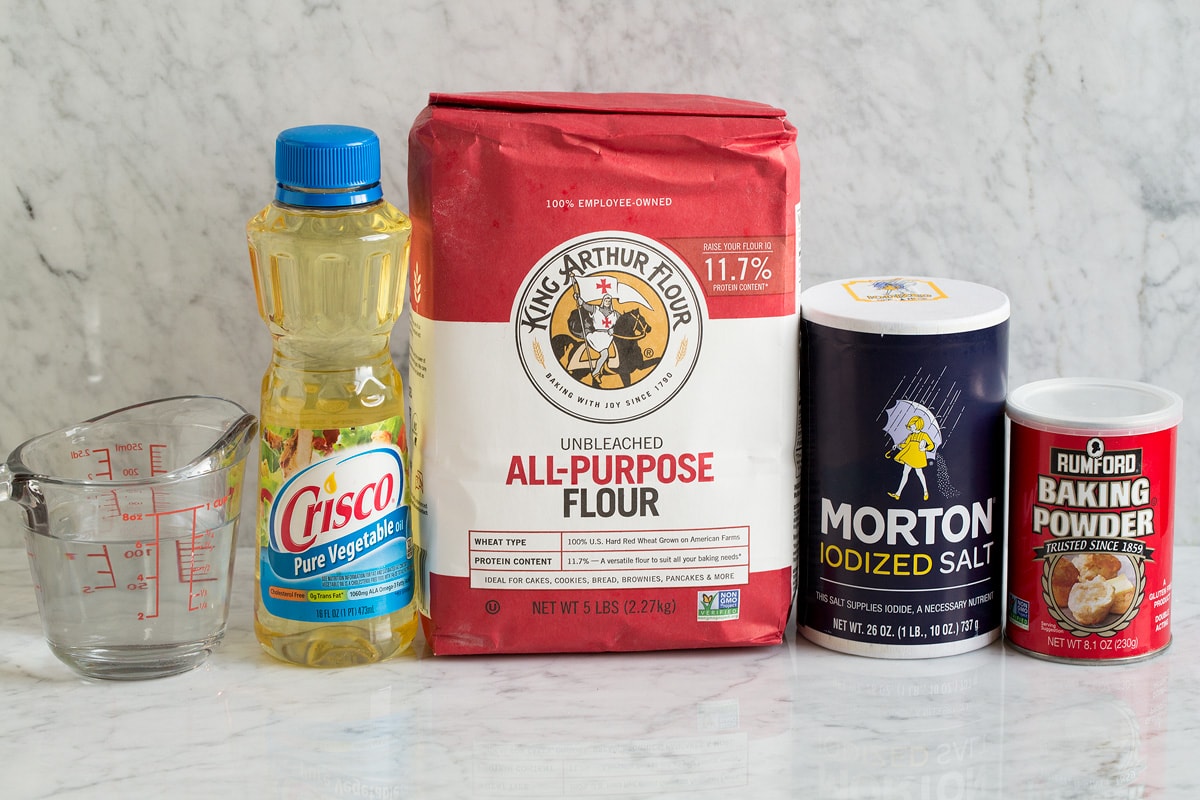 5 Ingredients needed to make flour tortillas from scratch shown here.