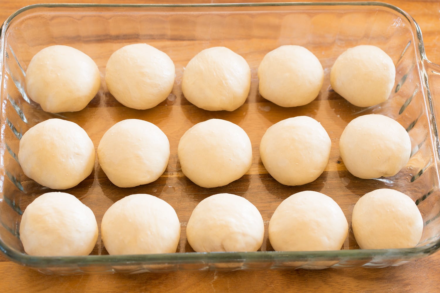 Rolls in baking dish before rising.