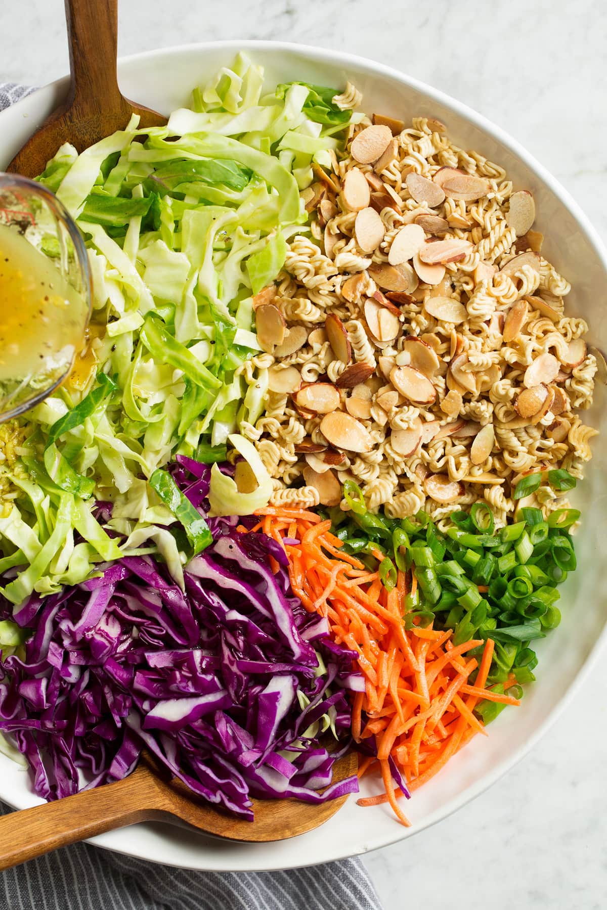 Overhead image of ramen noodle cabbage salad before tossing.