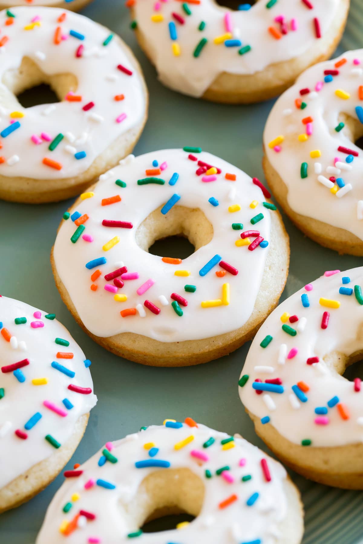 Close up photo of Baked Donuts on turquoise serving tray.