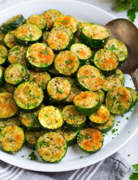 Baked zucchini shown sliced, from a side angle.