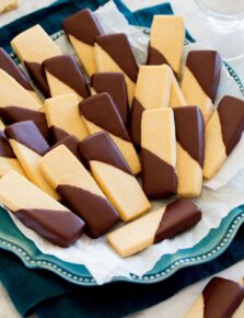 Rectangular shortbread cookies shown on a plate at a side angle.