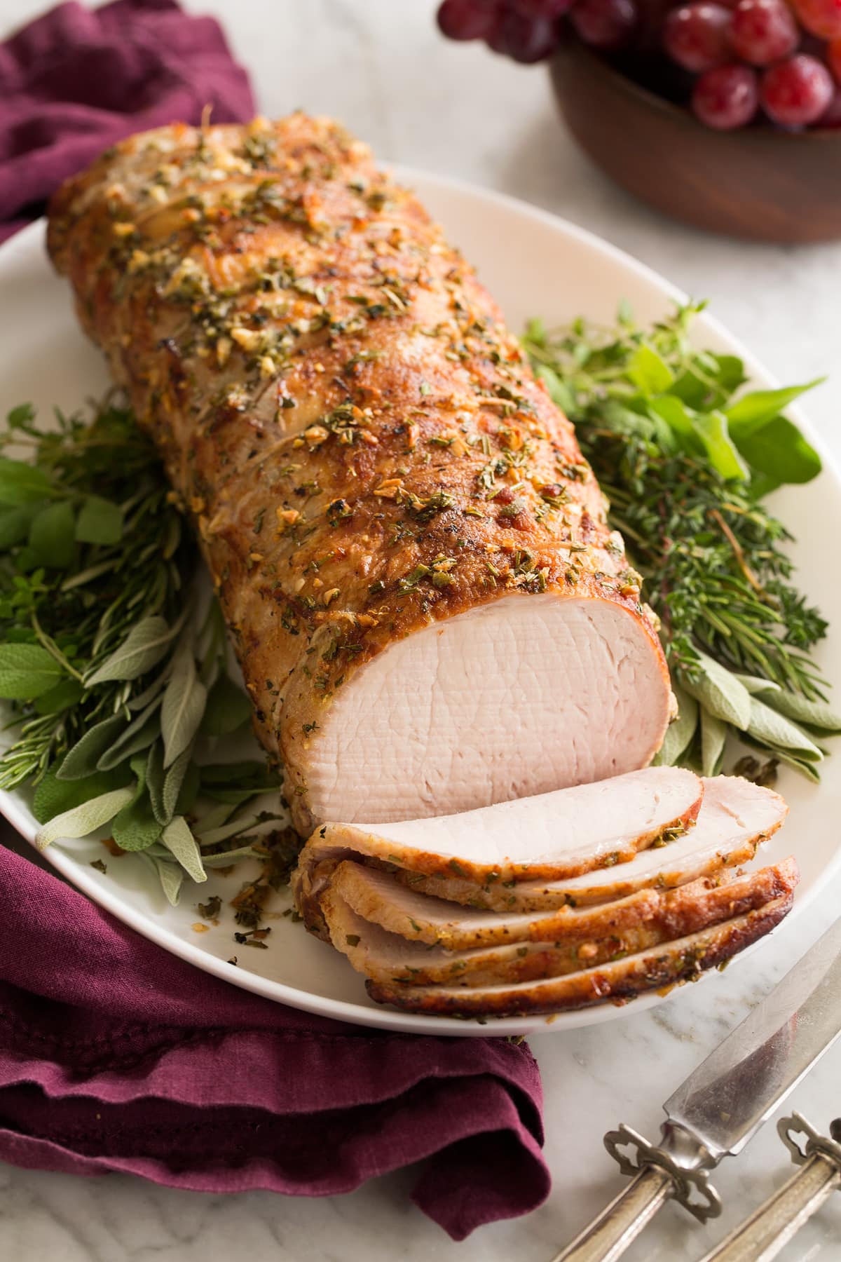 Pork loin roast shown at a side angle.