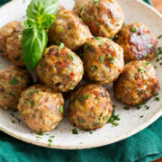 Close up photo of baked turkey meatballs.