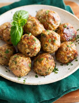 Close up photo of baked turkey meatballs.