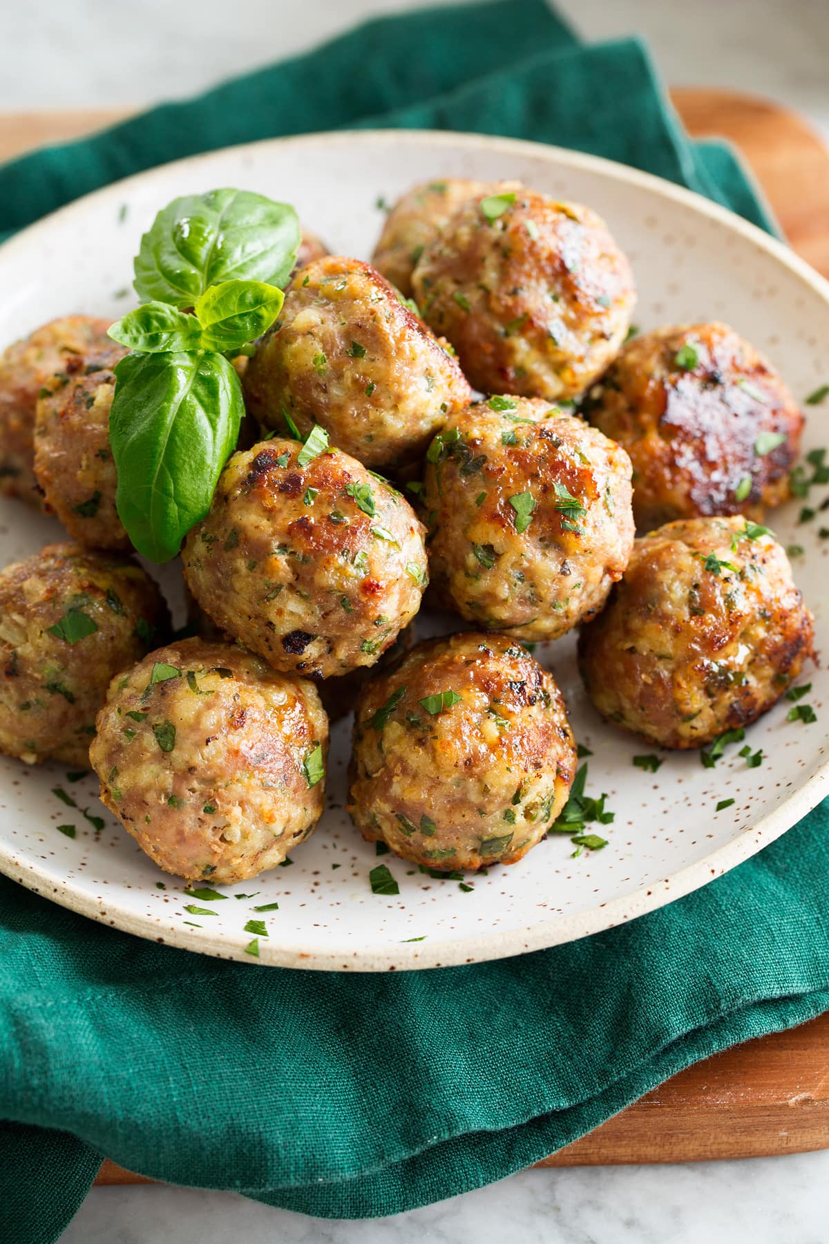 Close up photo of baked turkey meatballs.