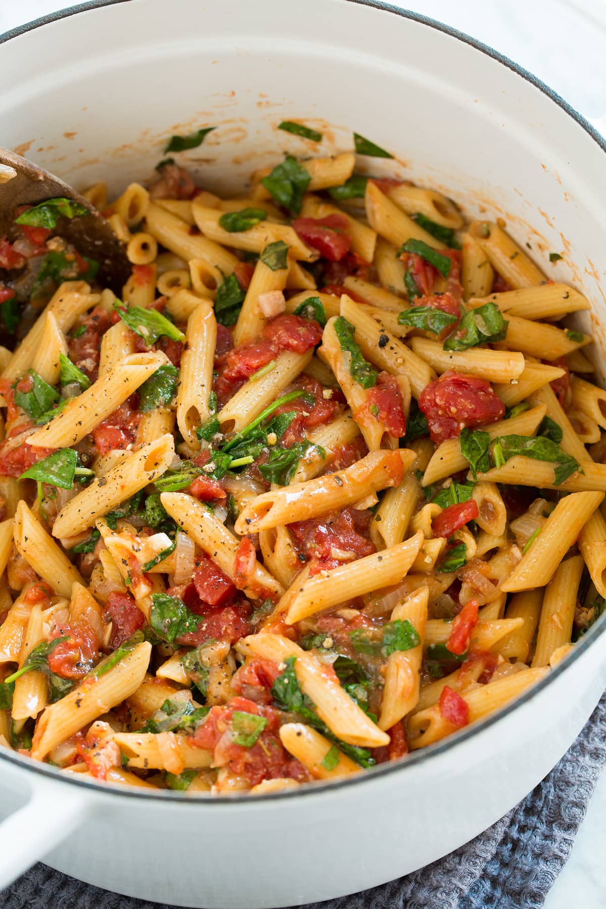 One Pot Pasta with tomatoes, basil, spinach and parmesan.