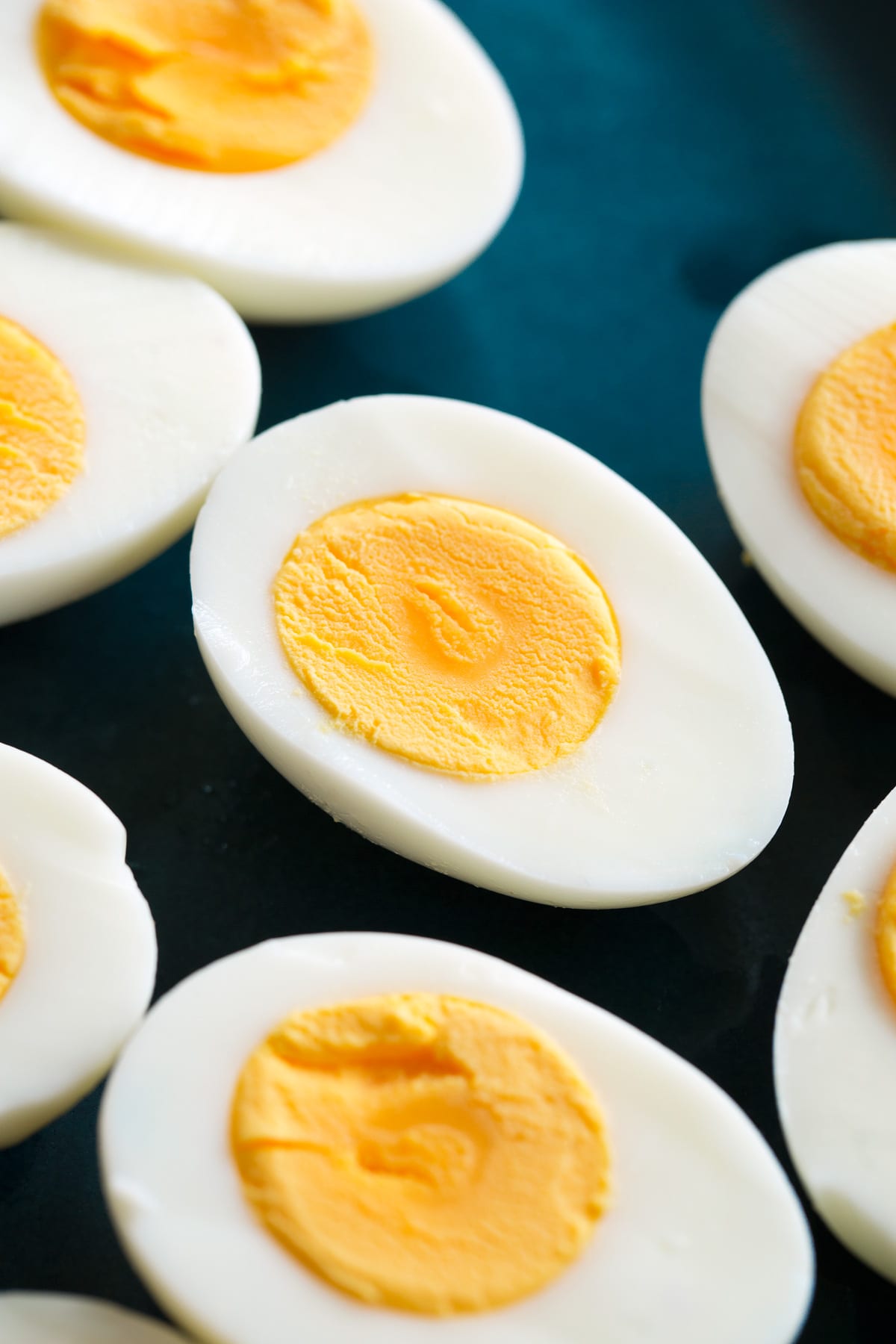 Close up photo of steamed eggs cut in half.