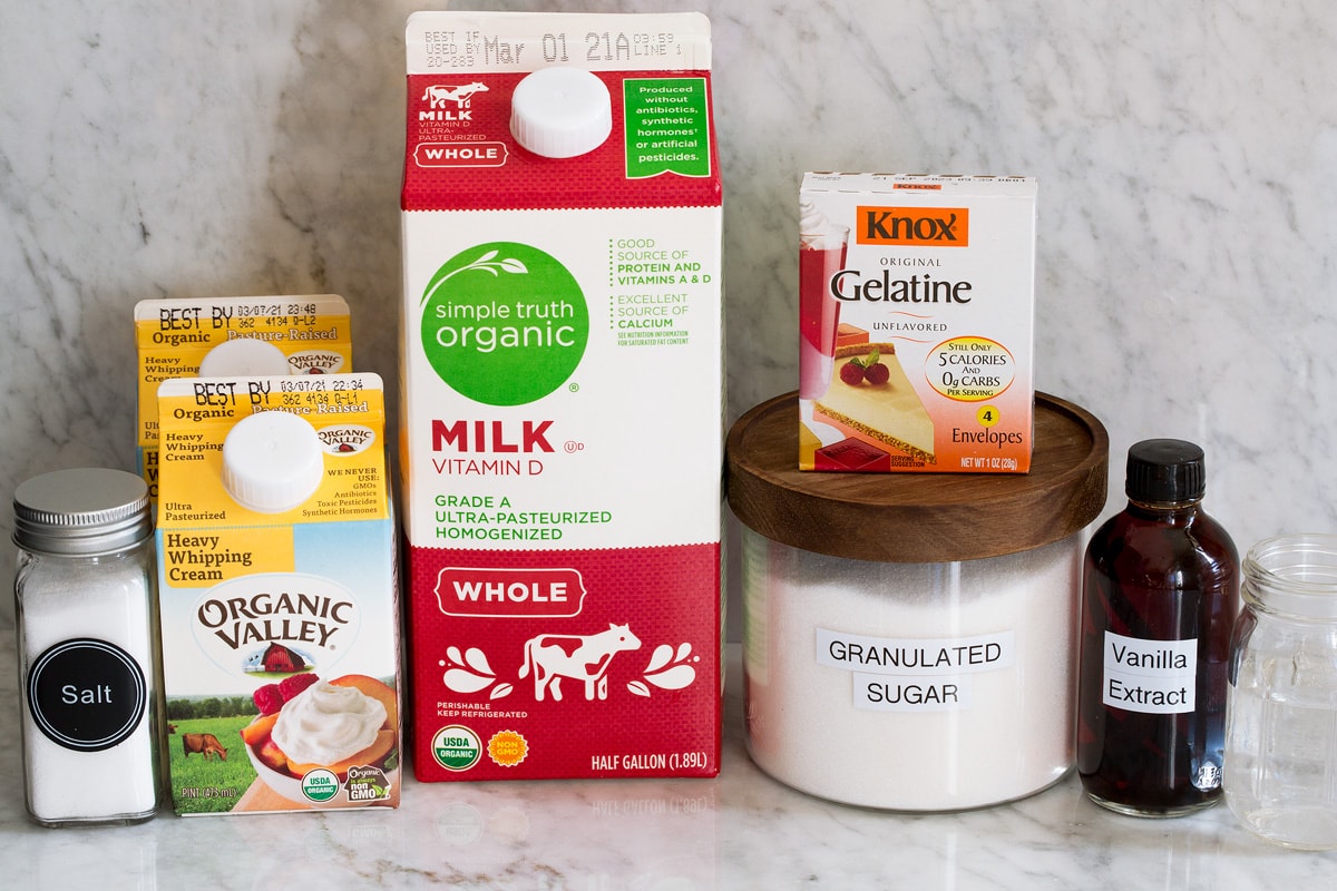 Image of ingredients used to make panna cotta. Includes whole milk, heavy cream, sugar, gelatin, vanilla, salt and water.