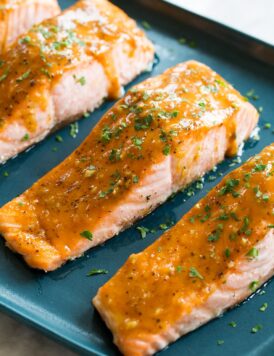 Close up photo of glazed baked salmon fillet.