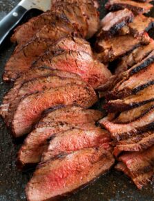 Close up photo of thinly sliced roasted tri tip.