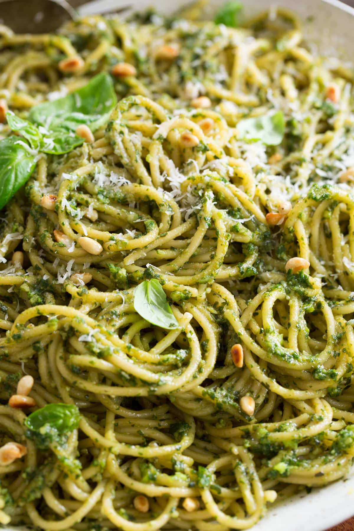 Close up photo of pesto pasta.