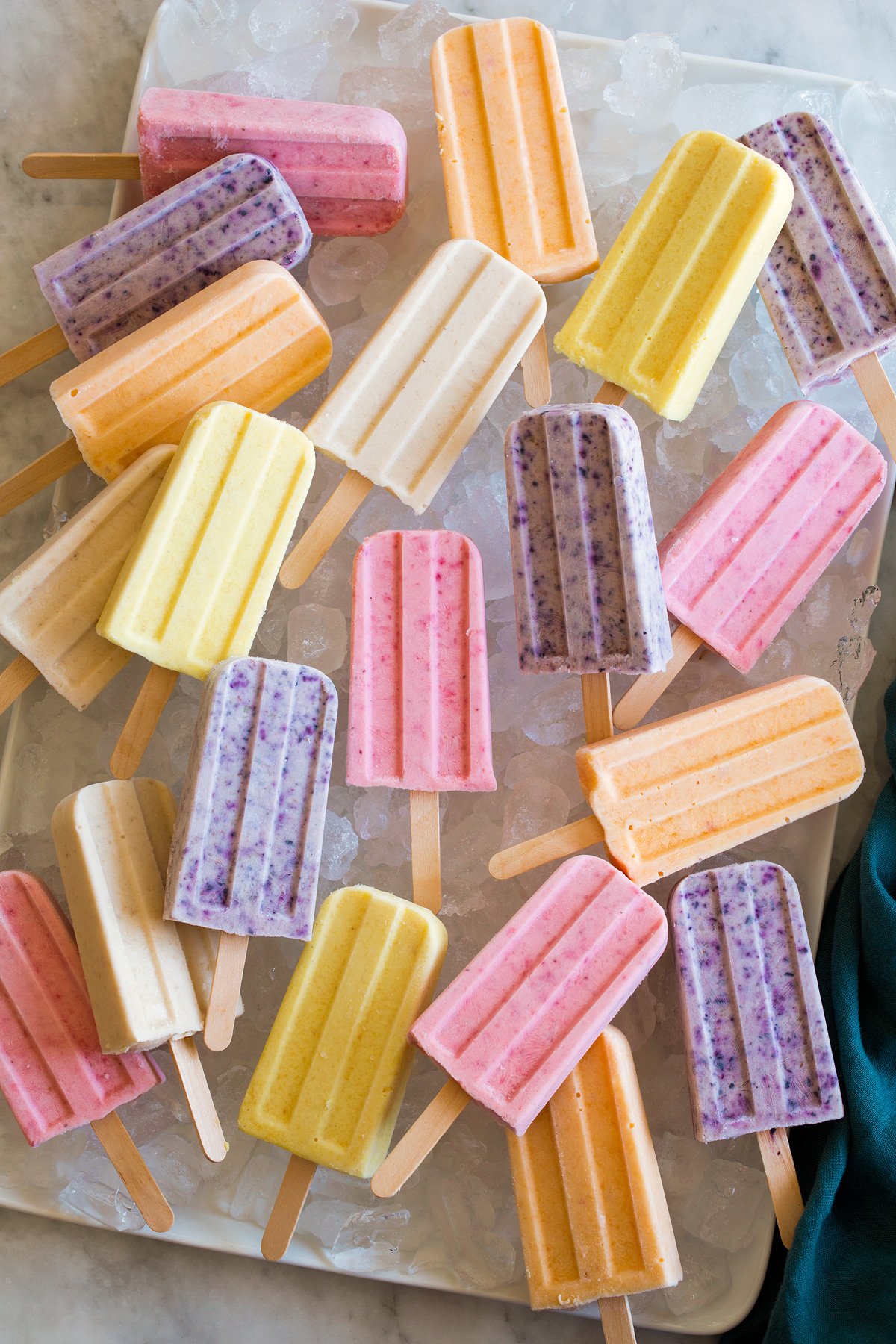 Platter with ice and homemade frozen popsicles.