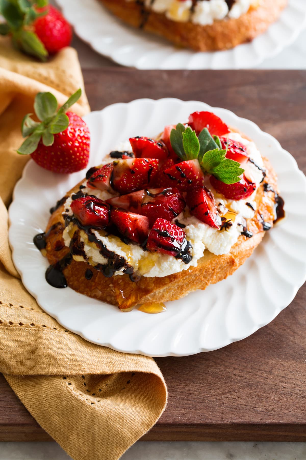 Strawberry ricotta toast with balsamic glaze.