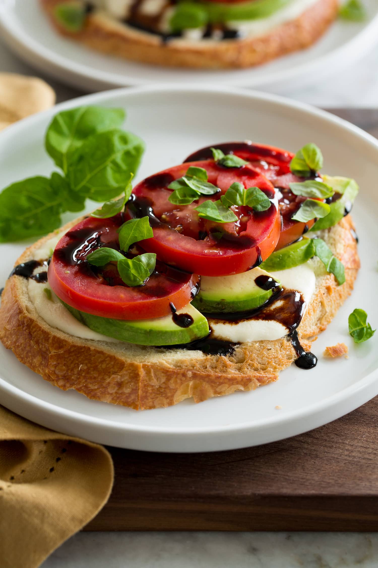 Caprese toast with balsamic glaze.