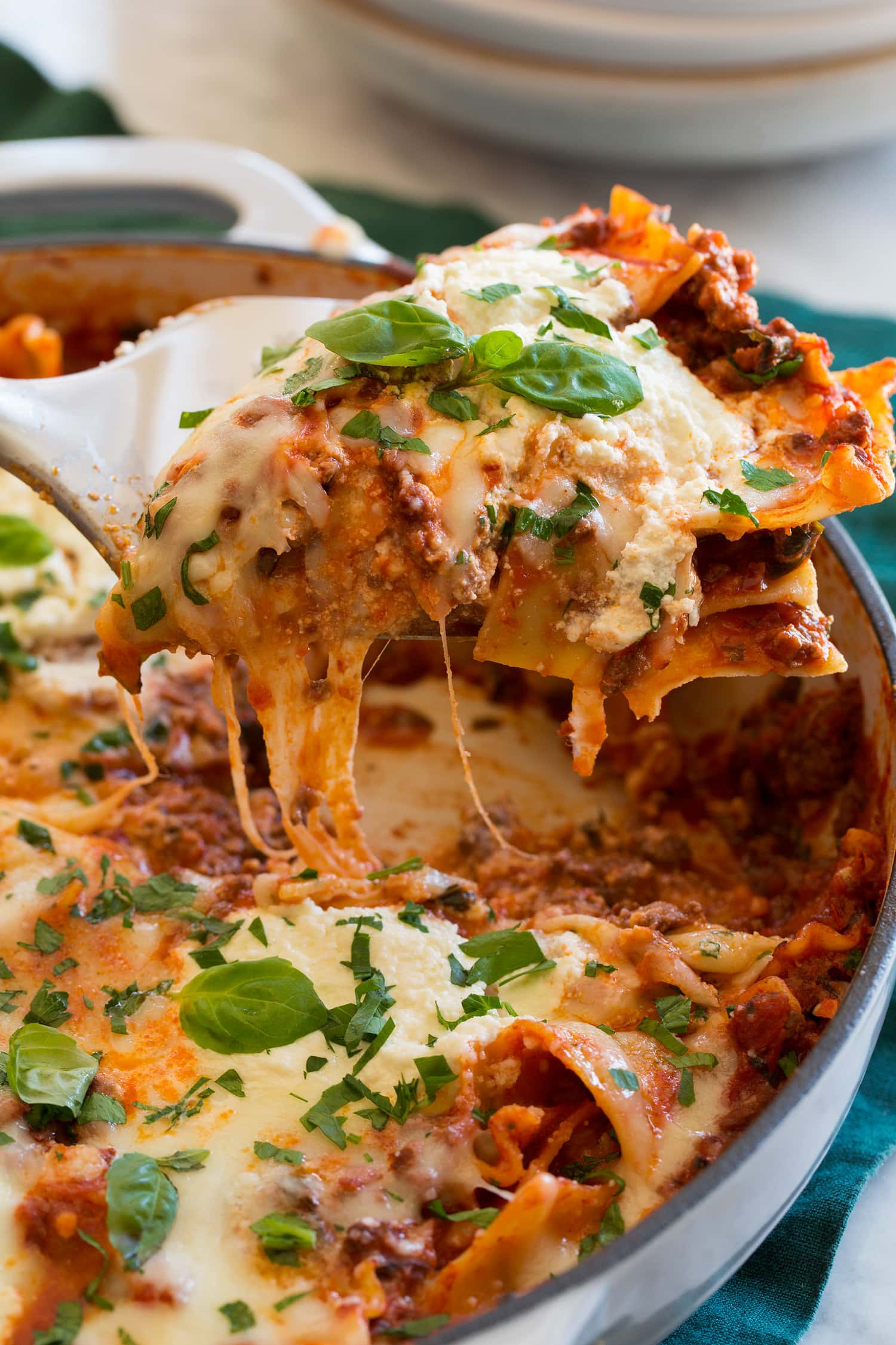 One pot lasagna slice being scooped.