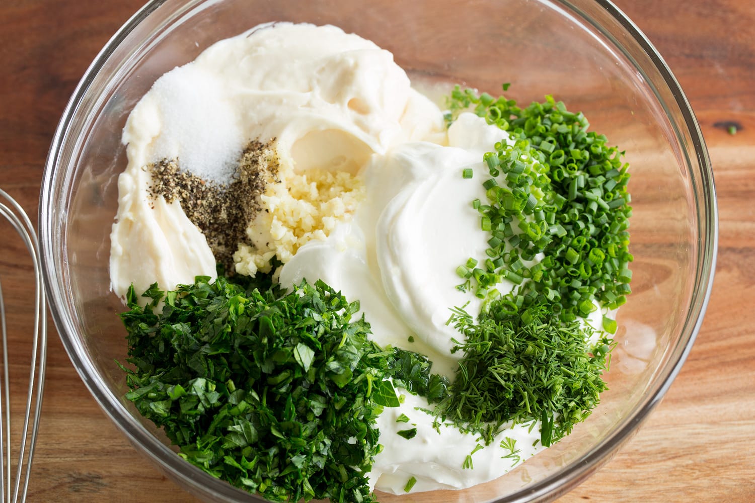 Ranch dip ingredients in a bowl before mixing.