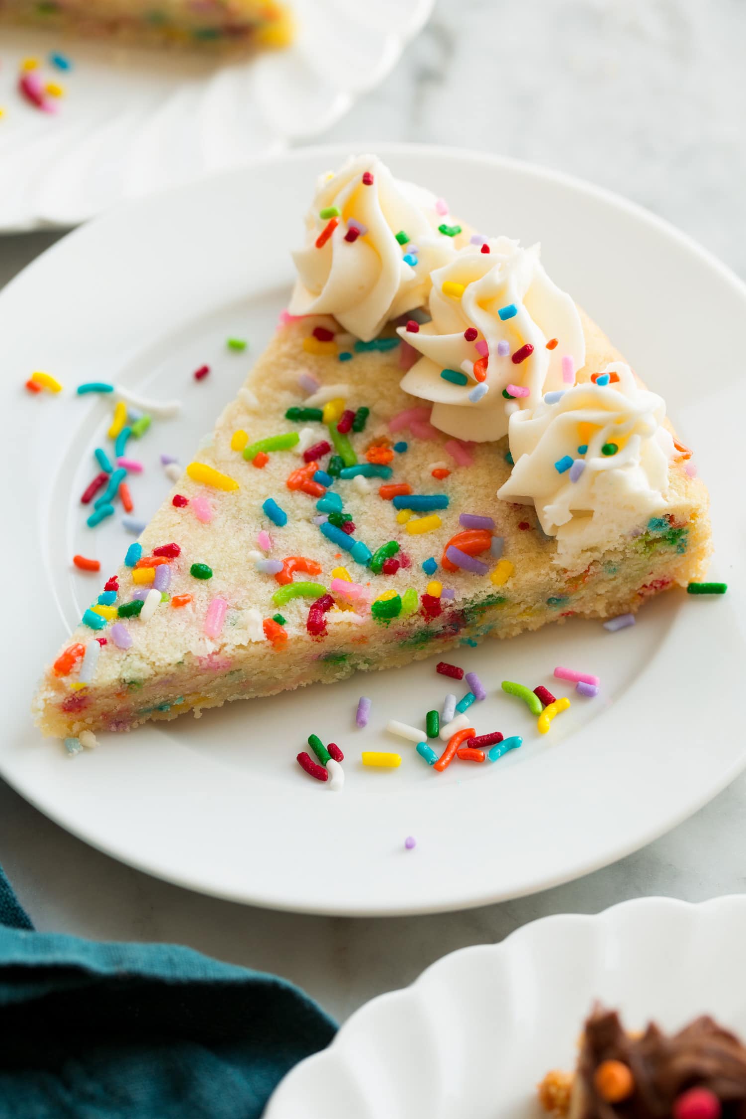 Slice of sugar cookie funfetti cake.