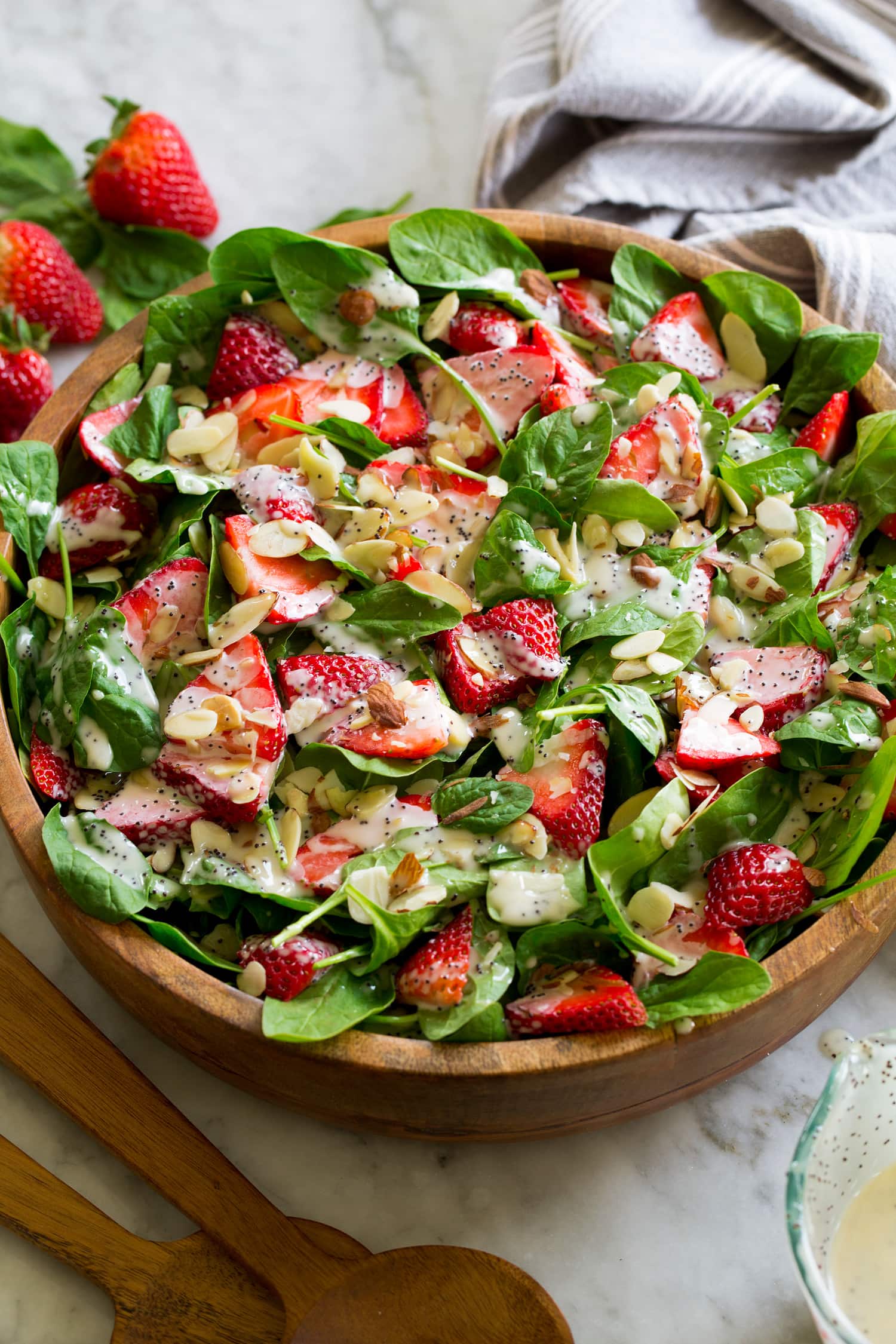 Homemade strawberry spinach salad with easy poppy seed dressing.