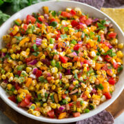 Corn salsa with corn, tomatoes, bell pepper, cilantro and onion.