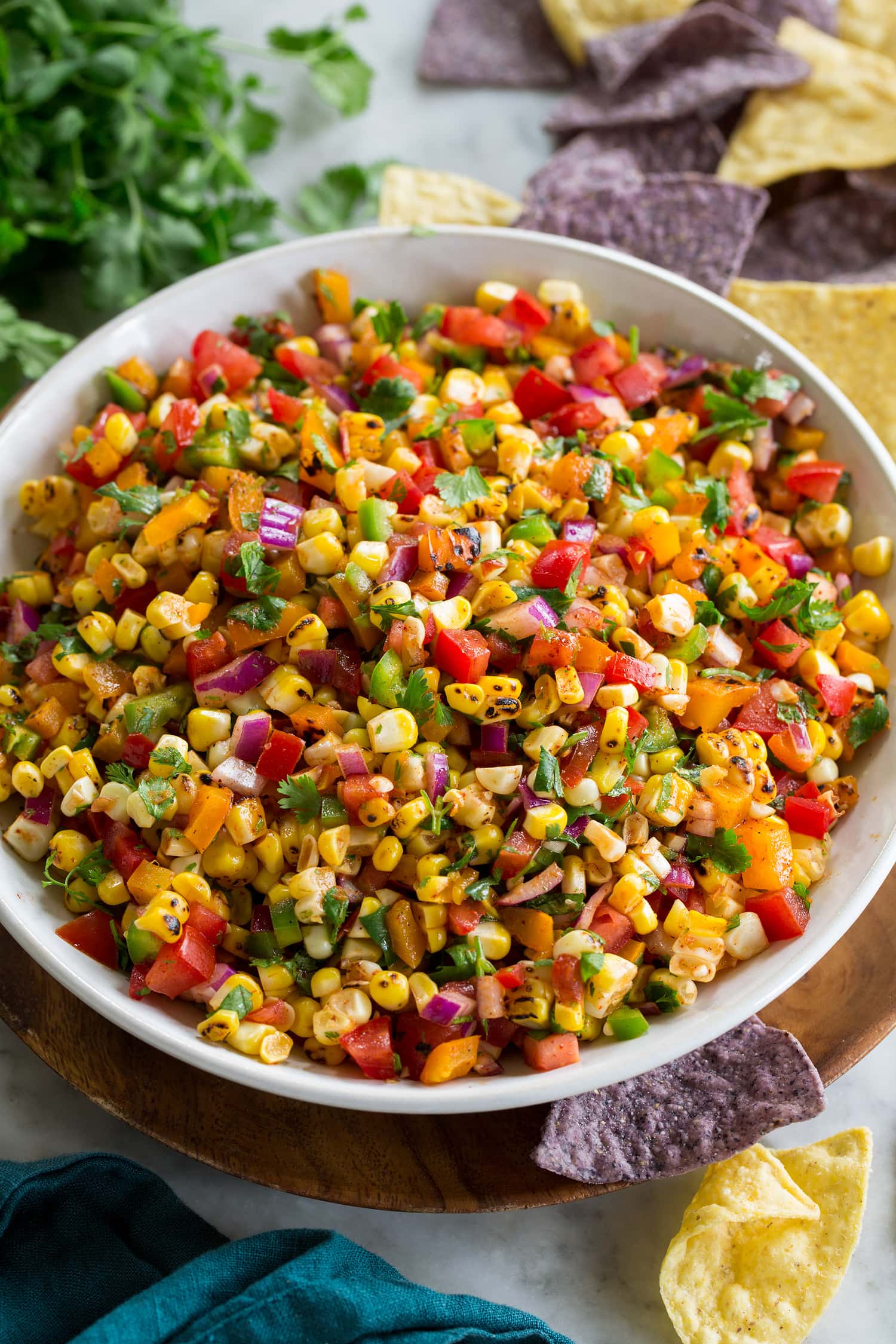 Corn salsa with corn, tomatoes, bell pepper, cilantro and onion.