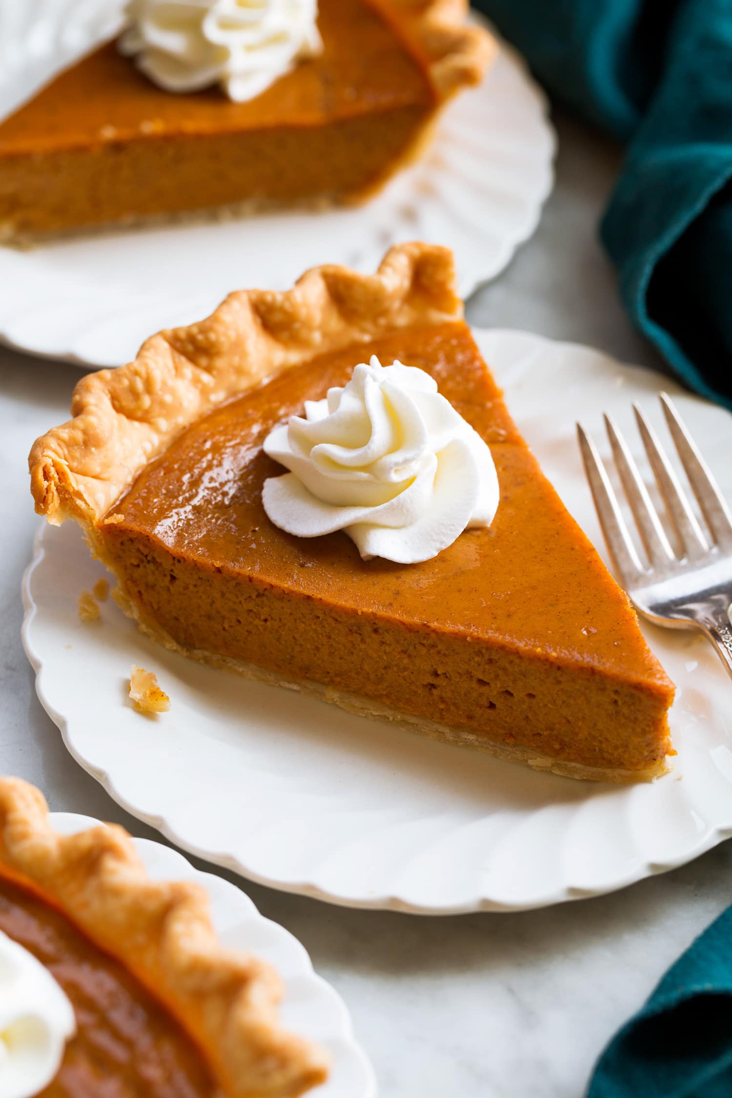 Slice of homemade easy 5 ingredient pumpkin pie.