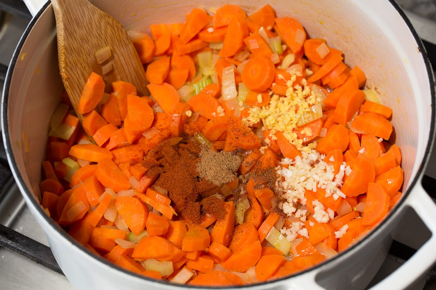 Spices, garlic and ginger added to sauteed vegetables.