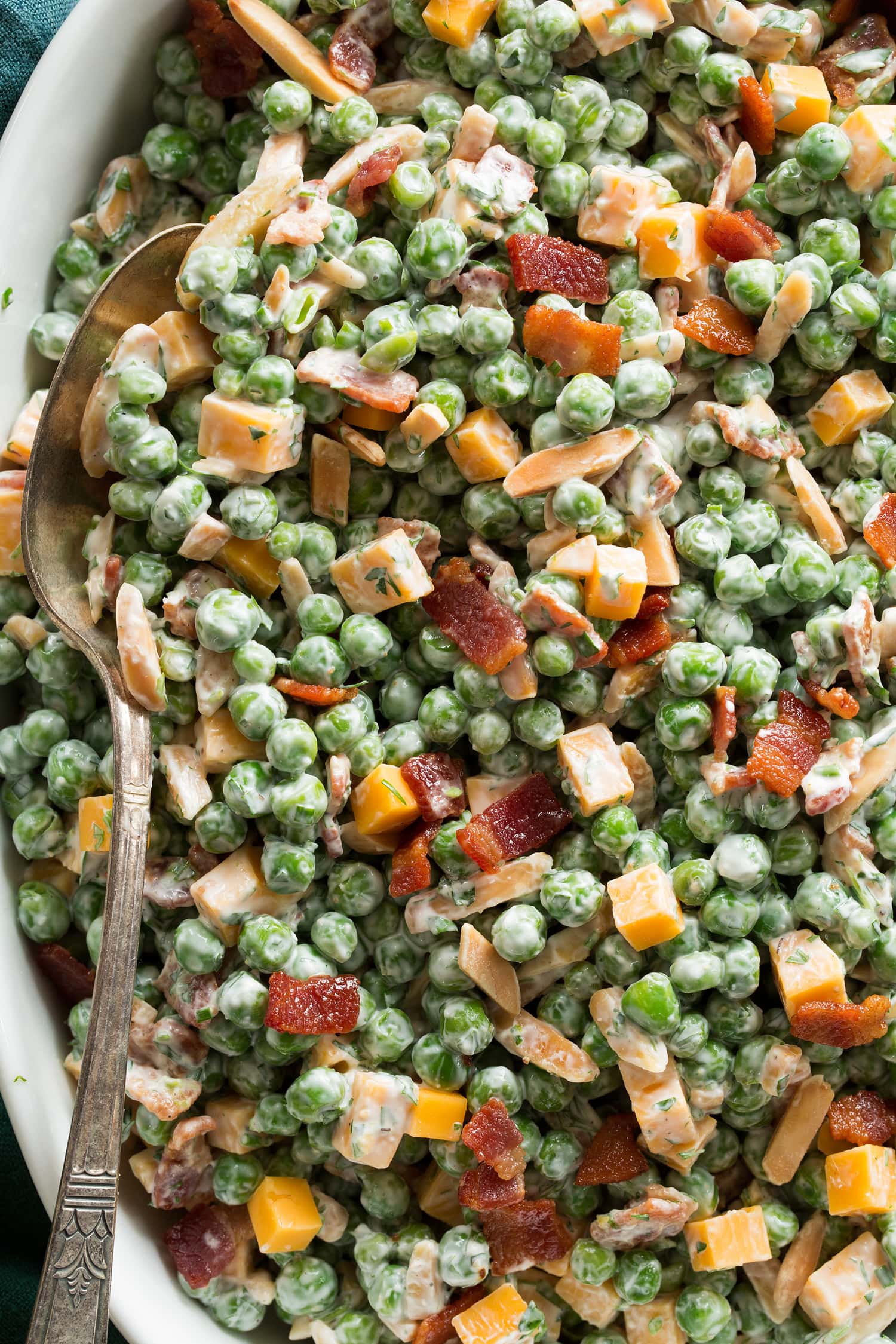 Close up overhead photo of creamy pea salad.