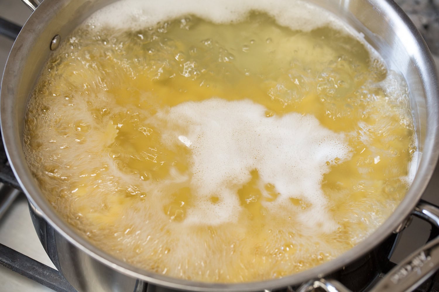 Pasta boiling in a pot of water.